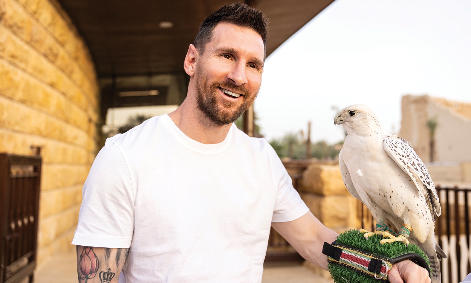 RIYADH: This handout picture provided by the Saudi Tourism Authority shows Argentina’s forward Lionel Messi holding a falcon in Riyadh. - AFP