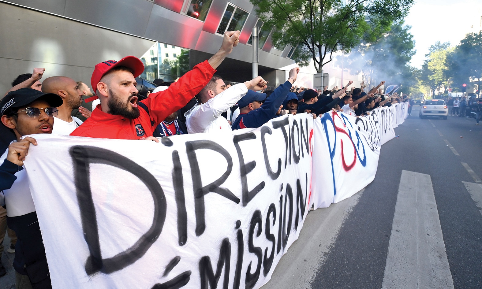 BOULOGNE-BILLANCOURT: Paris Saint Germain’s (PSG) football club supporters gathered in front of the club’s headquarters to protest over PSG’s current form and the Messi saga on May 3, 2023. – AFP
