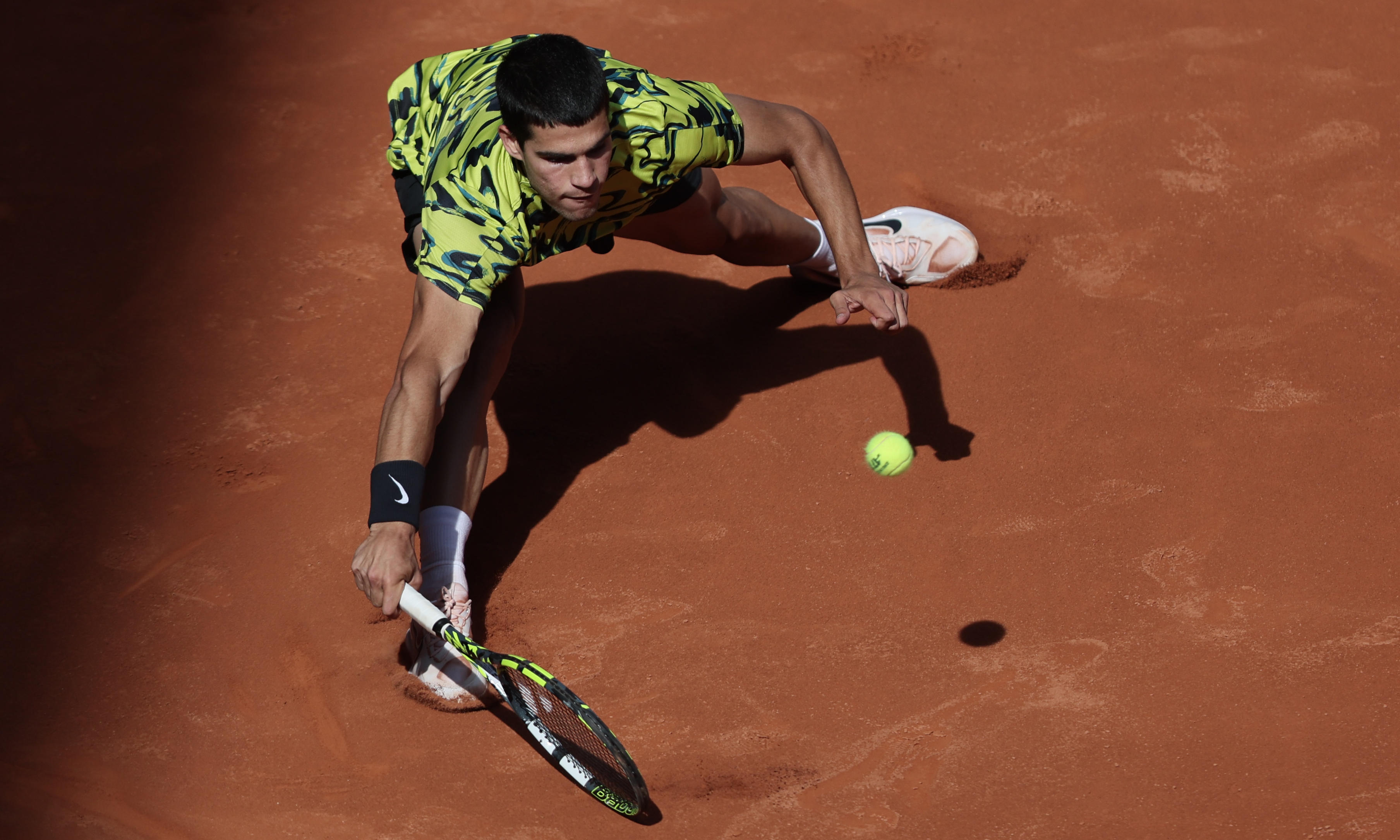 MADRID: Spain’s Carlos Alcaraz returns the ball to Russia’s Karen Khachanov during their 2023 ATP Tour Madrid Open tennis tournament singles quarter-final match on May 3, 2023. – AFP