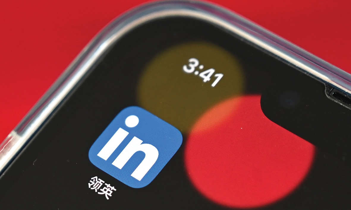 BEIJING: This file photo illustration taken on October 15, 2021 shows the LinkedIn China application on a mobile phone in Beijing. -- AFP