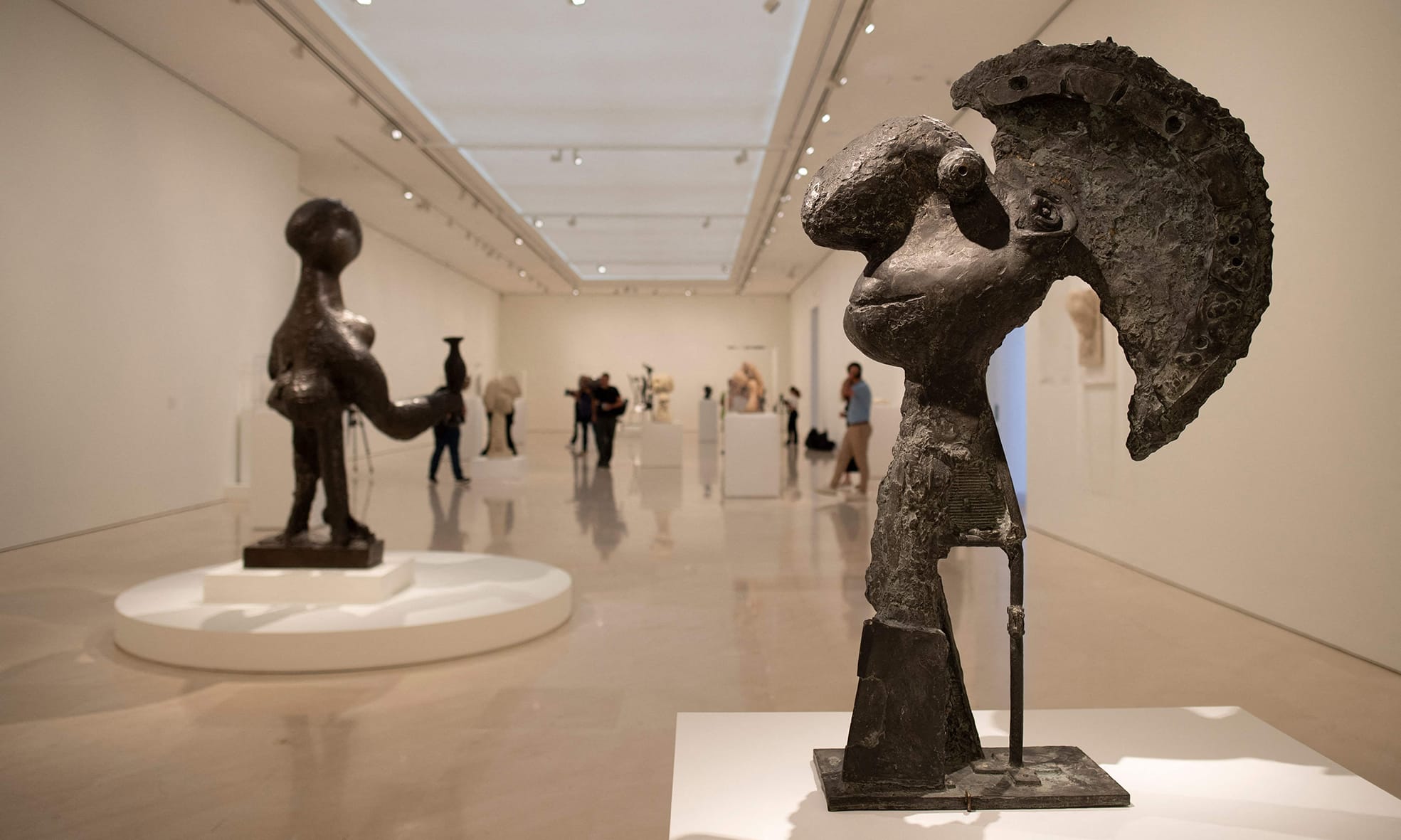 Visitors attend the inauguration of Spanish painter and sculptor Pablo Picasso's “Picasso Escultor.