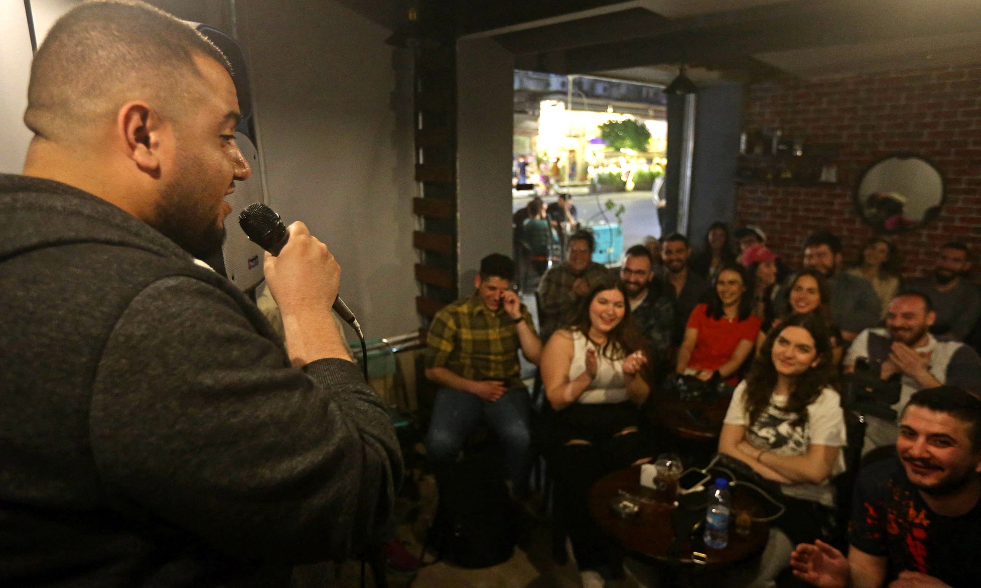 Hussein Al-Rawi performs during a comedy night titled 'Styria' which is an Arabic mash-up of Syria and hysteria, in Damascus.