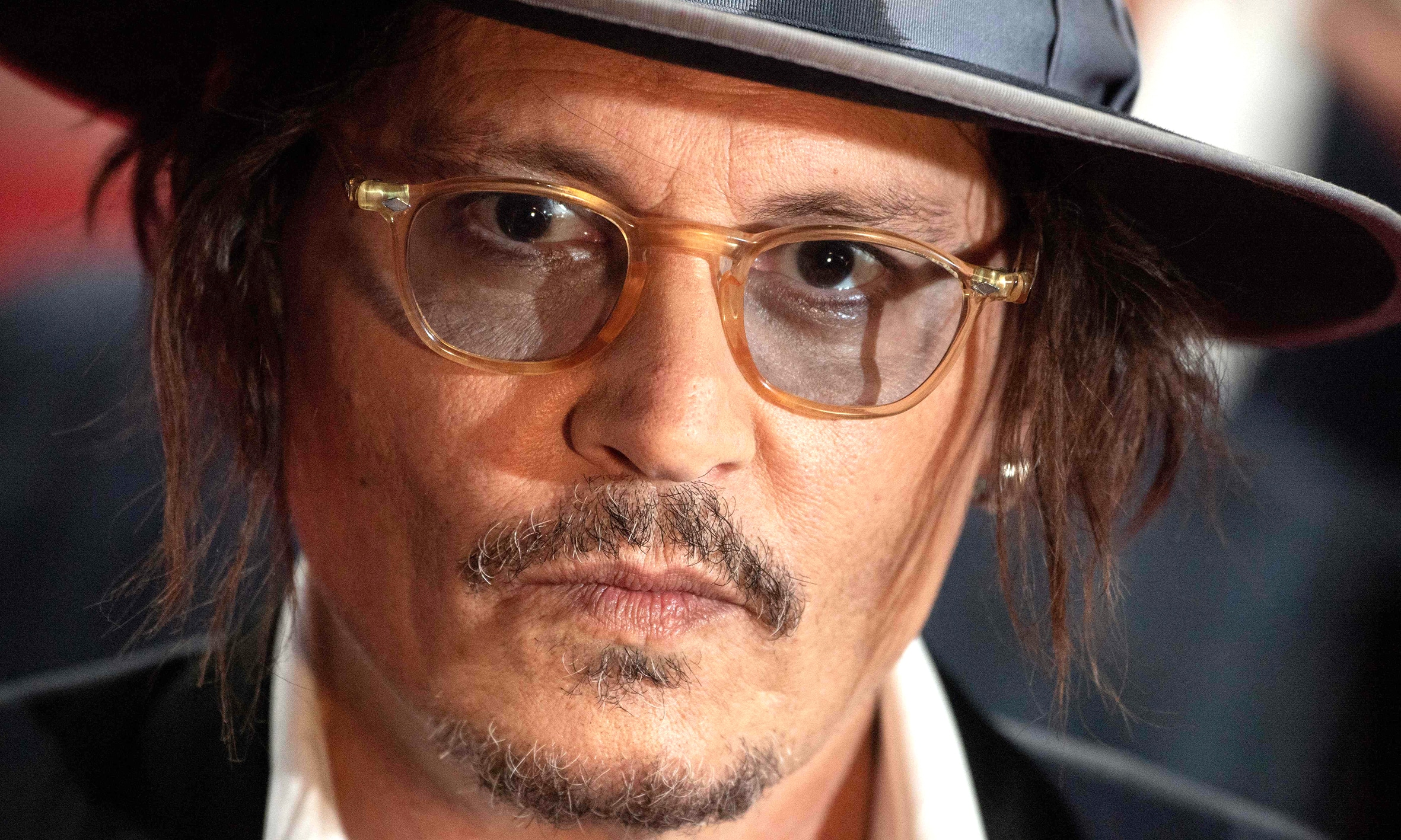 File picture shows US actor Johnny Depp arrives on the red carpet of the 47th Deauville US Film Festival in Deauville, western France.—AFP photos