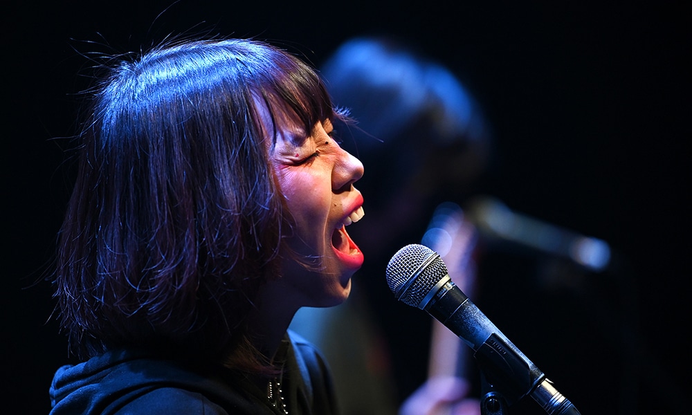 This photo shows lead singer Yuetu of punk band Xiaowang performing during a rehearsal ahead of a performance at a club in Beijing.