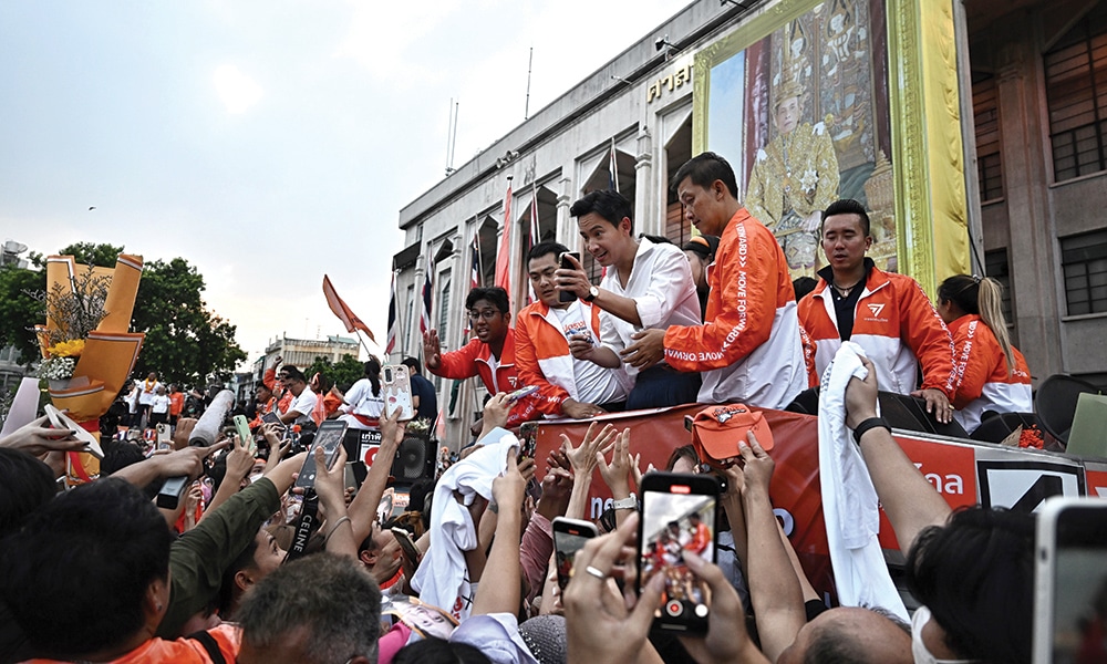 BANGKOK: Move Forward Party leader and prime ministerial candidate Pita Limjaroenrat leads a victory parade with fellow party members and supporters outside Bangkok City Hall on May 15, 2023. – AFP
