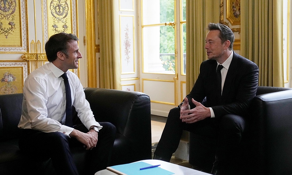 PARIS: SpaceX, Twitter and electric car maker Tesla CEO Elon Musk meets with France's President Emmanuel Macron (L) at the Elysee presidential palace in Paris on May 15, 2023. -AFP