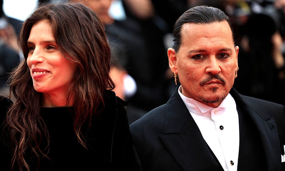 US actor Johnny Depp (R) arrives with French actress and directorright for the opening ceremony and the screening of the film 'Jeanne du Barry'.