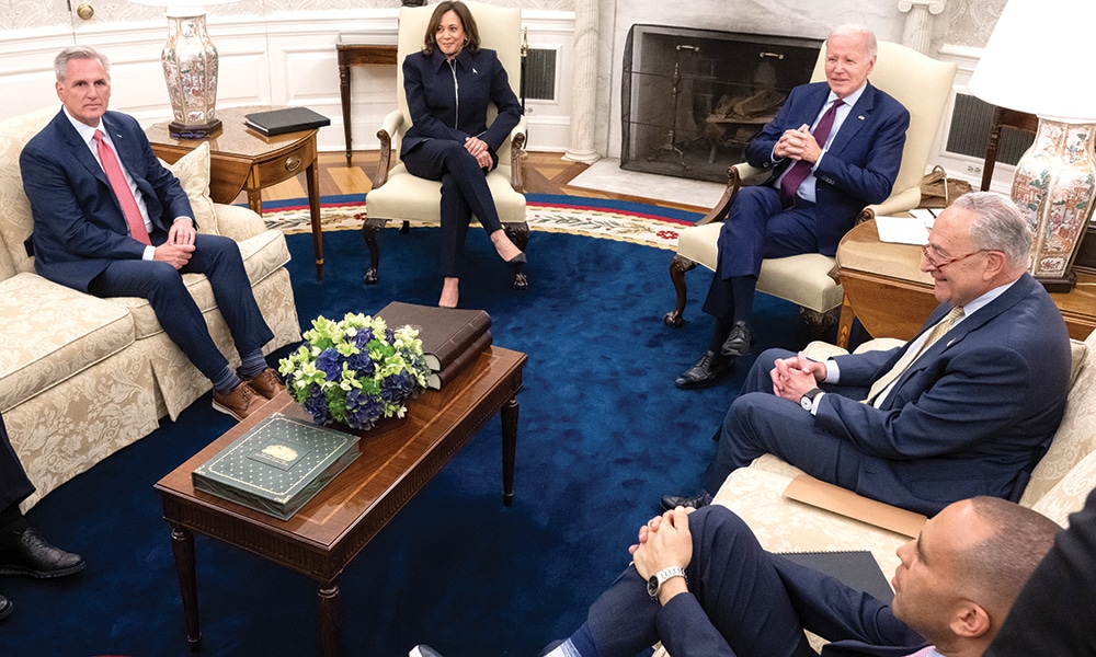 WASHINGTON: US President Joe Biden (center) speaks during a meeting on the debt limit with (left to right) US House Speaker Kevin McCarthy, US Vice President Kamala Harris, Senate Majority Leader Chuck Schumer, and House Minority Leader Hakeem Jeffries in the Oval Office of the White House in Washington, DC, on May 16, 2023. -- AFP