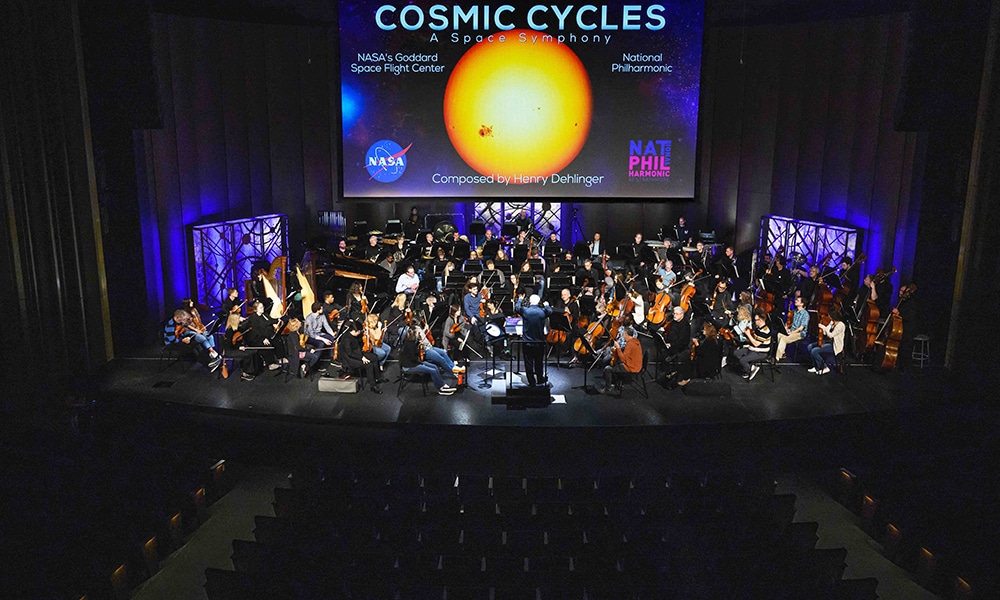 National Philharmonic Music Director and Conductor Piotr Gajewski rehearses 'Cosmic Cycles, A Space Symphony' by composer Henry Dehlinger, at Capital One Hall in Arlington, Virginia.