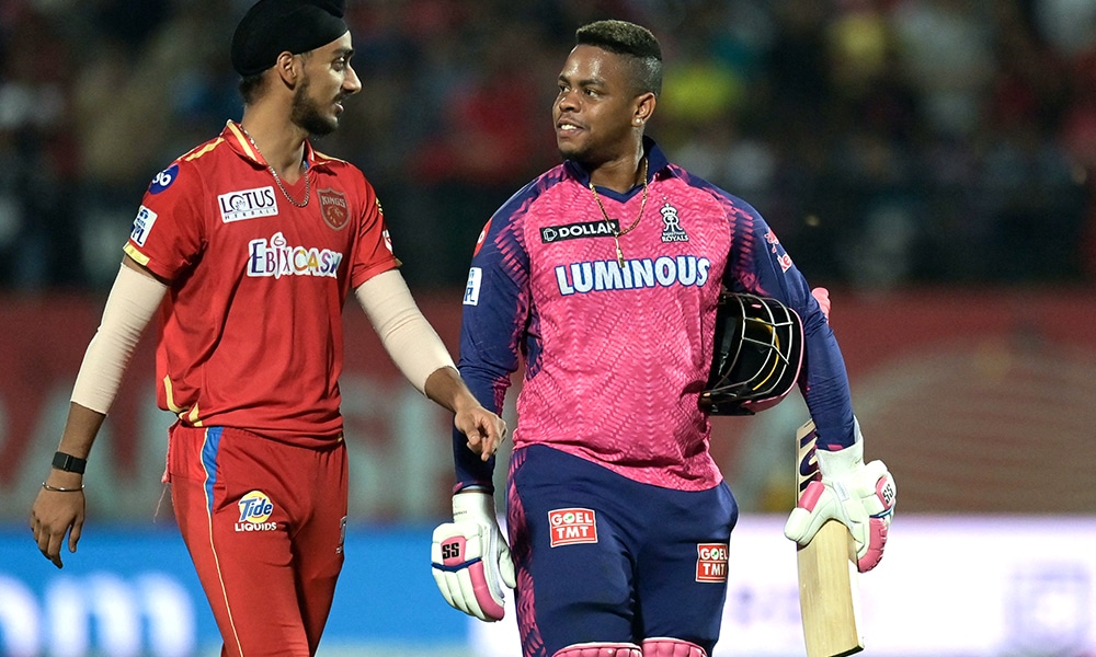 DHARAMSALA: Rajasthan Royals’ Shimron Hetmyer (right) speaks with Punjab Kings’ Arshdeep Singh as he walks back to the pavilion after his dismissal during the Indian Premier League (IPL) Twenty20 cricket match between Punjab Kings and Rajasthan Royals on May 19, 2023. – AFP