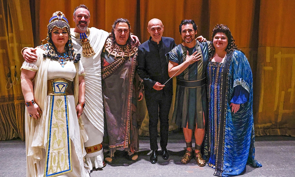 (From left to right) Opera singers Olesya Petrova, Christian Van Horn, George Gagnidze, conductor Paolo Carignani, Jorge de Leon and Leah Crocetto pose backstage after the final performance of Giuseppe Verdi's 'Aida' at the Metropolitan Opera House in Lincoln Center.--AFP photos