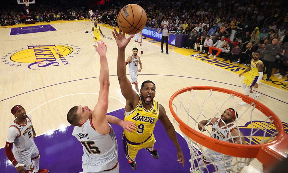 LOS ANGELES: Tristan Thompson #9 of the Los Angeles Lakers shoots the ball past Nikola Jokic #15 of the Denver Nuggets during the second half in game four of the Western Conference Finals on May 22, 2023. - AFP