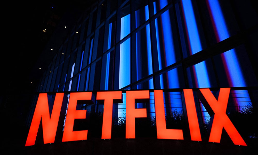 The Netflix logo at the Netflix Tudum Theater in Los Angeles, California.--AFP