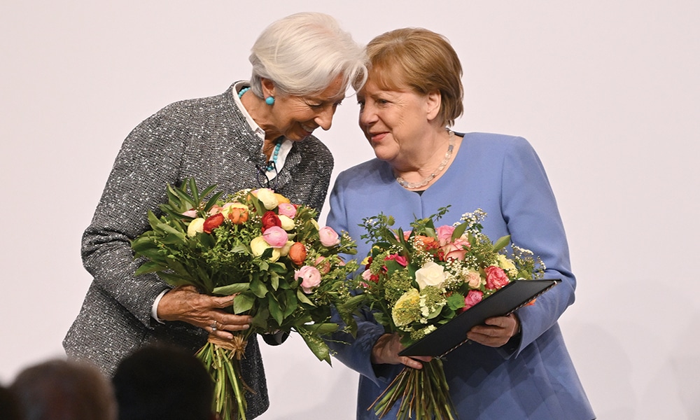 COLOGNE: Former German Chancellor Angela Merkel talks to European Central Bank (ECB) President Christine Lagarde after being awarded the 'Staatspreis des Landes Nordrhein-Westfalen' (State Prize of the federal state of North Rhine-Westphalia) on May 16, 2023 in Cologne.-- AFP