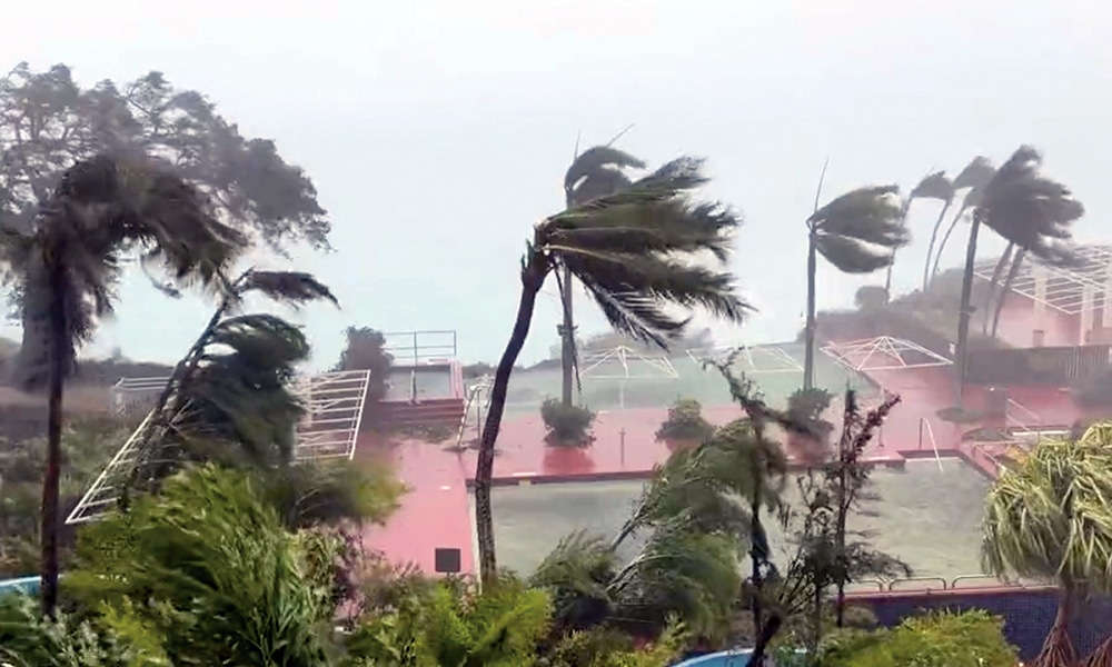 TUMON BAY, US: This video grab from the Twitter page of James Reynolds @EarthUncutTV shows tropical storm force winds blowing across Tumon Bay, Guam on May 24, 2023. – AFP