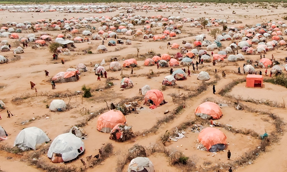 DOLOW: This aerial view shows makeshift structures of people displaced by drought at the Ladan internally displaced people (IDP) camp in Dolow. More than a million Somalis have been displaced within their own country due to a ‘toxic’ mix of drought, conflict and floods, the UN and a charity said on May 24, 2023. – AFP
