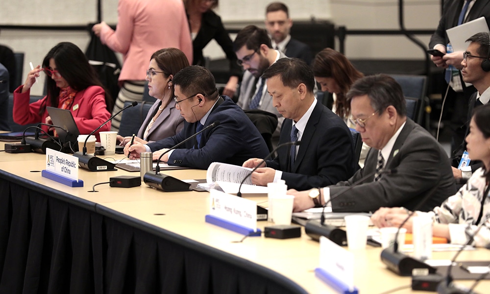 DETROIT: Members of the People Republic of China delegation at the table before the APEC Ministers Responsible for Trade meeting in Detroit, Michigan.- AFP