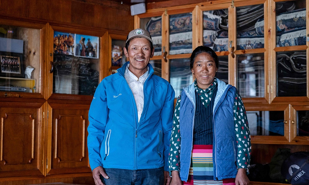 Phurba Tashi Sherpa, head of an expedition operator and guide, posing with his wife during an interview with AFP at the village of Khumjung.