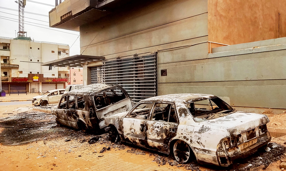 KHARTOUM: Destroyed vehicles are pictured outside the burnt-down headquarters of Sudan's Central Bureau of Statistics, on al-Sittin (sixty) road in the south of Khartoum. – AFP