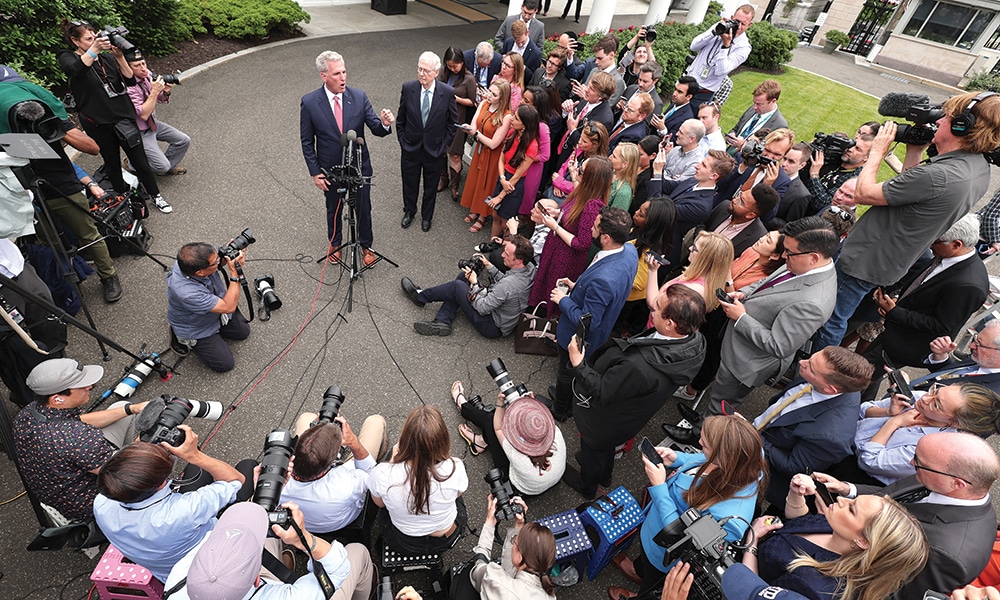 WASHINGTON: Speaker of the House Kevin McCarthy (R-CA) (left) and Senate Minority Leader Mitch McConnell (R-KY) talk to reporters outside the West Wing after meeting with US President Joe Biden and Vice President Kamala Harris about raising the debt limit.- AFP