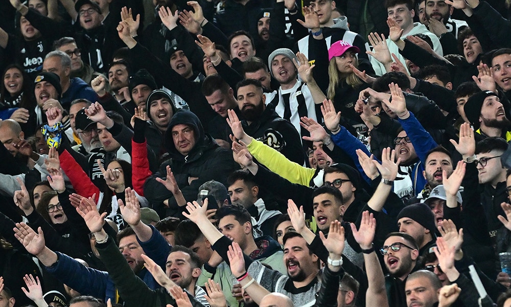 ROME: Juventus fans cheer prior to the Italian Serie A football match at the Olympic stadium in Rome. – AFP