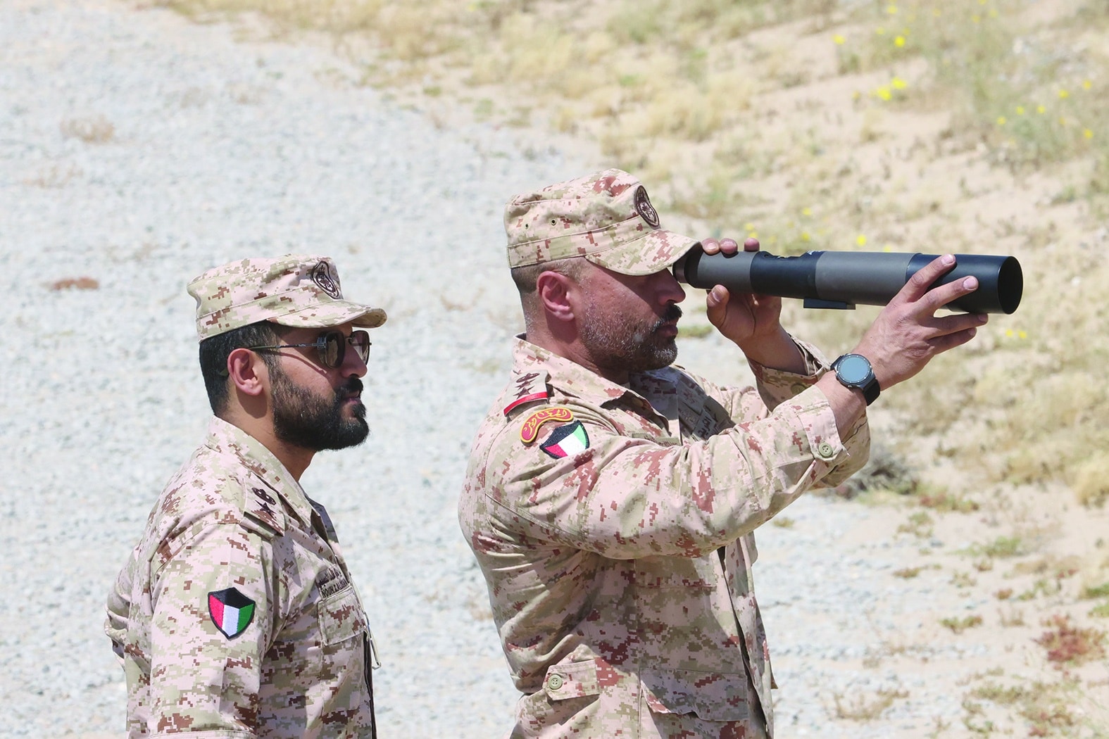 Kuwaiti military personnel observe the drill held at US Camp Arifjan, about 60 kilometres south of Kuwait City, on May 4, 2023. -- Photos by Yasser Al-Zayyat