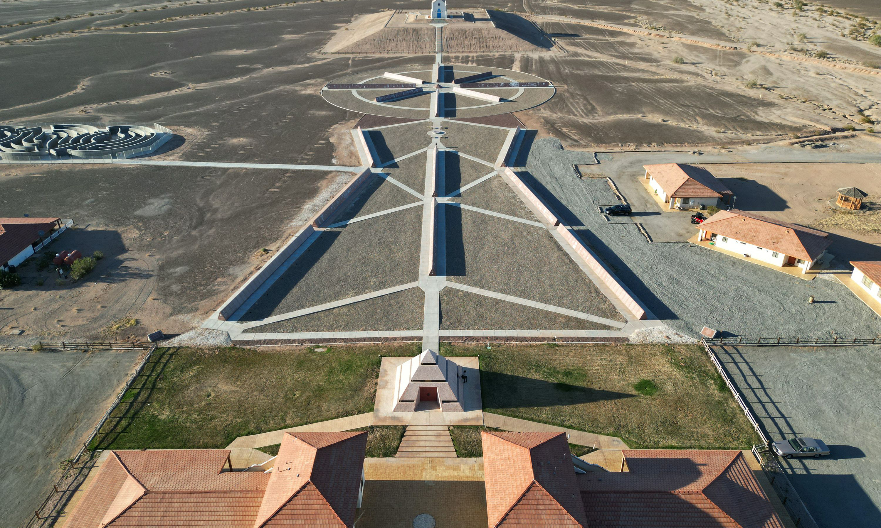 An aerial view of the tiny town of Felicity, home of The Museum of History in Granite, The Church on the Hill and a 21-foot-tall stone-and-glass pyramid marking the “Official Center of the World.” The tiny town of Felicity, which borders Yuma, Arizona and Mexico, was founded by French-American Jacques-Andre Istel, 94, and is the home of Istel’s passion project, the Museum of History in Granite. — AFP photos