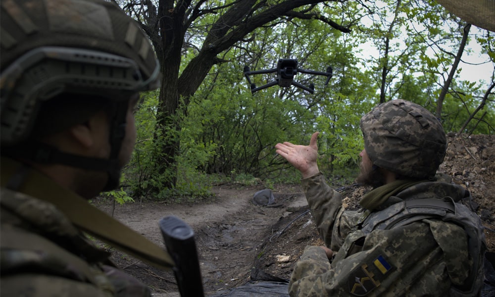 Ukrainian servicemen of a Reconnaissance team fly a drone at a front line near the town of Bakhmut, Donetsk region on May 8, 2023, amid the Russian invasion of Ukraine.