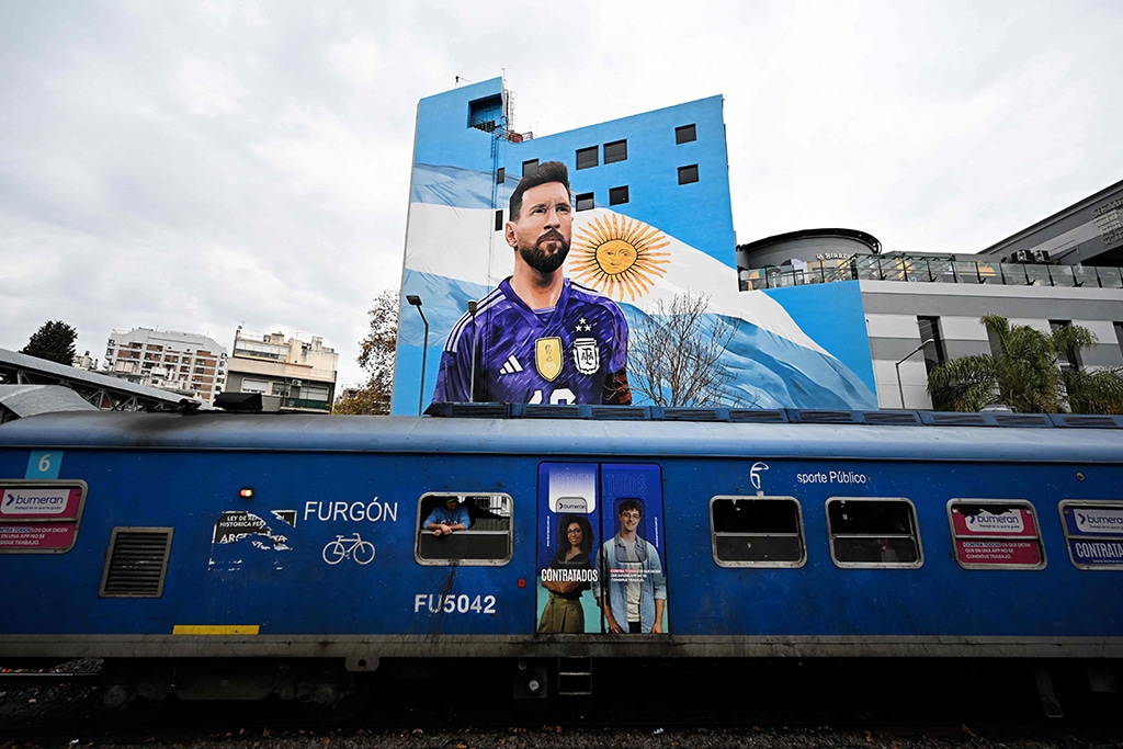 BUENOS AIRES: Photo shows a view of a mural painting depicting Argentine football star Lionel Messi at the Villa del Parque train station in Buenos Aires.- AFP