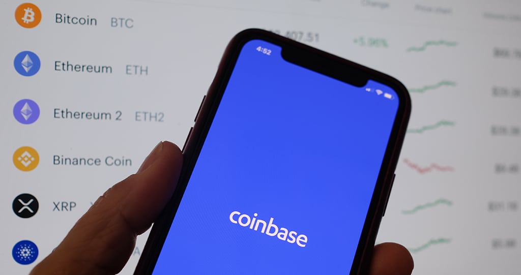 CULVER CITY: Photo shows the Coinbase logo on a smartphone in Los Angeles. US securities regulators sued Coinbase, alleging that the cryptocurrency platform’s failure to register as a securities exchange venue exposed investors to risk. - AFP