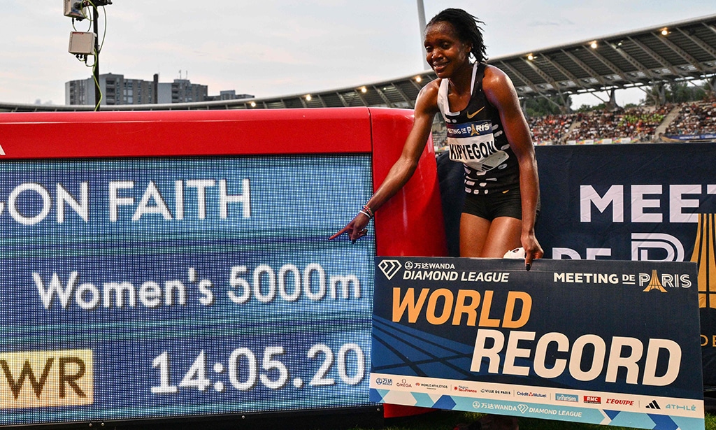 PARIS: Kenya’s Faith Kipyegon poses after breaking the World record in the women’s 5000m event during the IAAF Diamond League “Meeting de Paris” athletics on June 9, 2023. – AFP