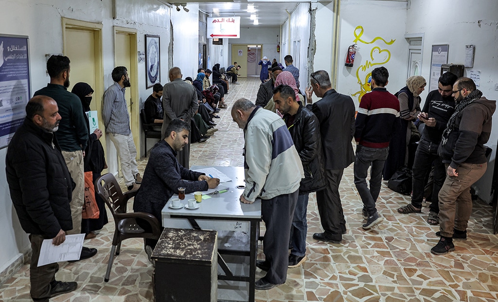 IDLIB: In this picture taken on May 2, 2023, people register as they arrive at the Haematology and Oncology department run by the Syrian American Medical Society (SAMS) at Idlib Central Hospital in the rebel-held northwestern Syrian city. – AFP