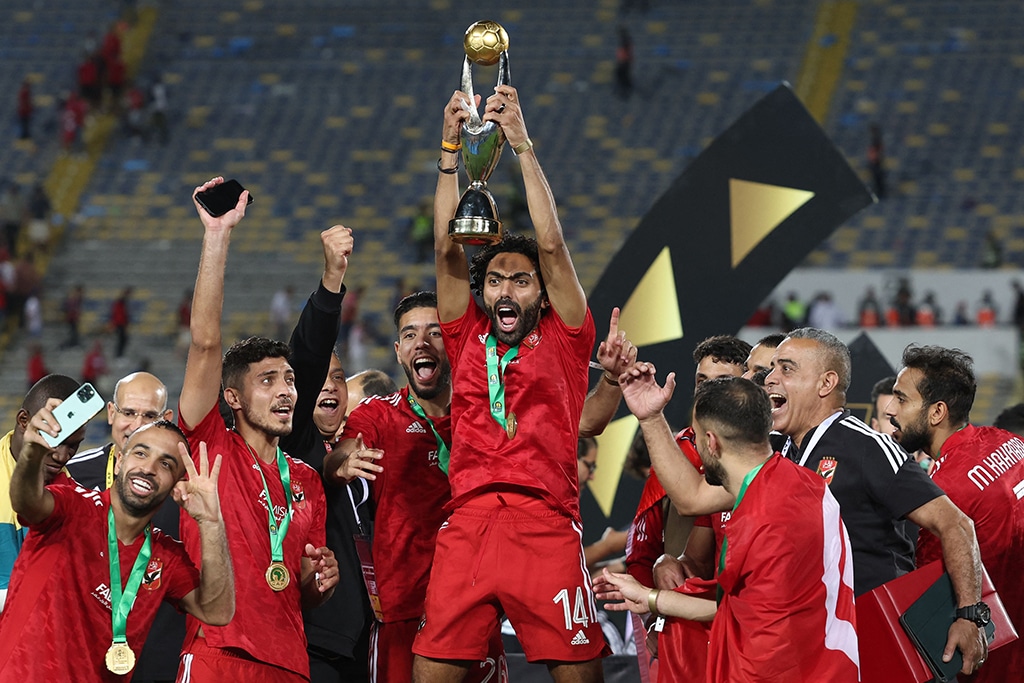 CASABLANCA: Ahly’s Egyptian midfielder Hussein El-Shahat (center) celebrates with the trophy after winning the CAF Champions League final football match between Morocco’s Wydad AC and Egypt’s Al-Ahly on June 11, 2023. – AFP