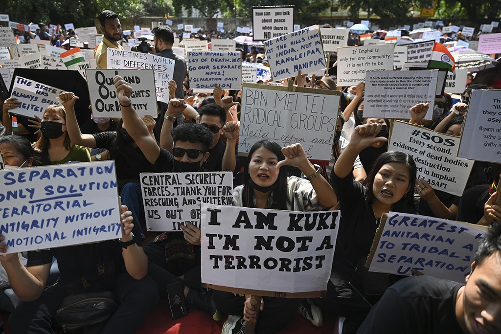 NEW DELHI: Activists of the All Tribal Students Union Manipur (ATSUM) hold placards during a protest amid ongoing ethnic violence in India's northeastern Manipur state, in New Delhi. – AFP