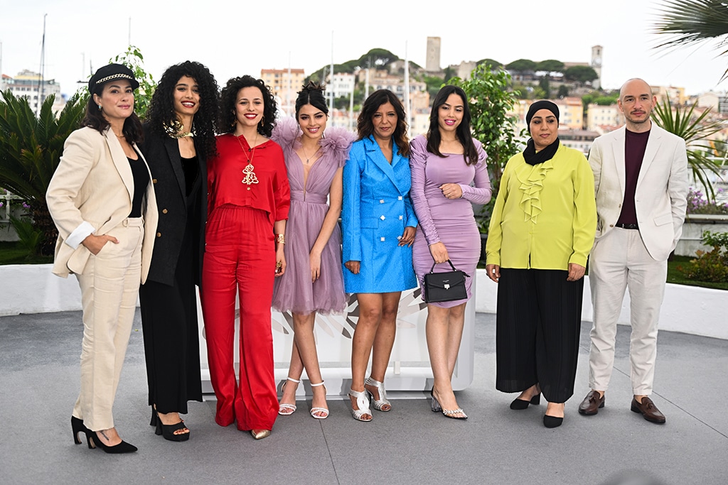 (From left) Tunisian actress Hend Sabri, Tunisian actress Ichraq Matar, Tunisian actress Nour Karoui, Tunisian actress Tayssir Chikhaoui, Tunisian director Kaouther Ben Hania, actress Eya Chikahoui, Tunisian actress Olfa Hamrouni and Tunisian actor Majd Mastoura pose during a photocall for the film 'Les Filles D’Olfa' (Four Daughters) at the 76th edition of the Cannes Film Festival in Cannes.