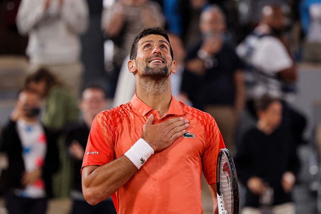 PARIS: Serbia’s Novak Djokovic celebrates after winning against Hungary’s Marton Fucsovics at the end of their men’s singles match on day four of the Roland-Garros Open tennis tournament on May 31, 2023. – AFP
