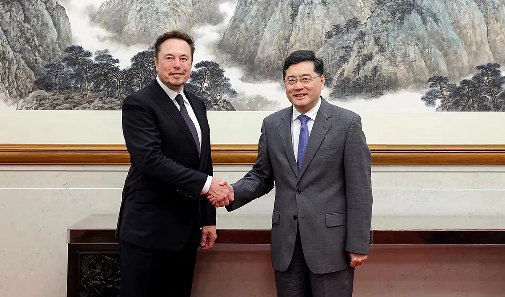 BEIJING: Tesla CEO Elon Musk (L) shaking hands with China's Foreign Minister Qin Gang during a meeting in Beijing. Elon Musk met Foreign Minister Qin Gang in Beijing, the ministry said, as the Tesla CEO embarks on his first trip to China in more than three years. – AFP