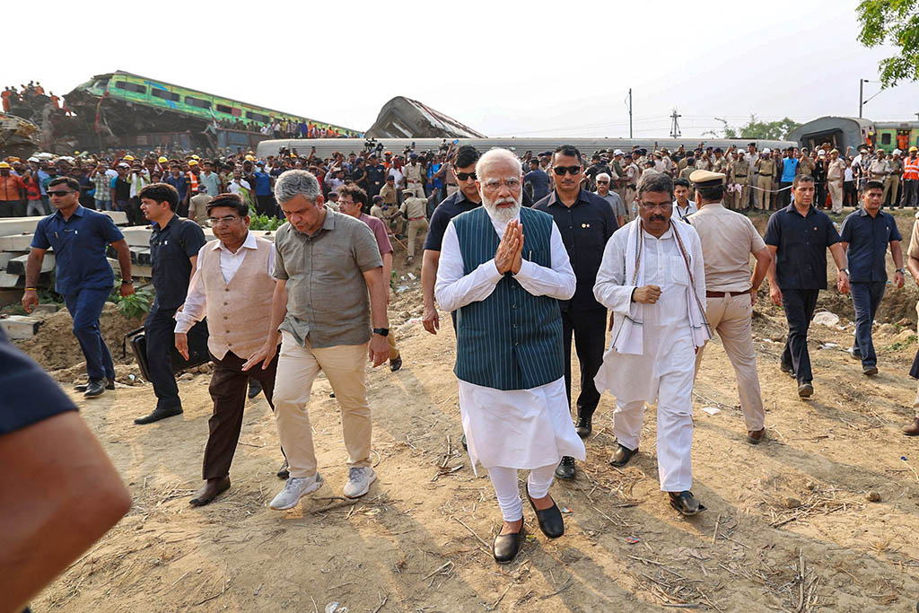 BALASORE, India: This handout photograph taken on June 3, 2023 shows India’s Prime Minister NarendranModi visiting the site of a three-train collision in India’s eastern state of Odisha. — AFP