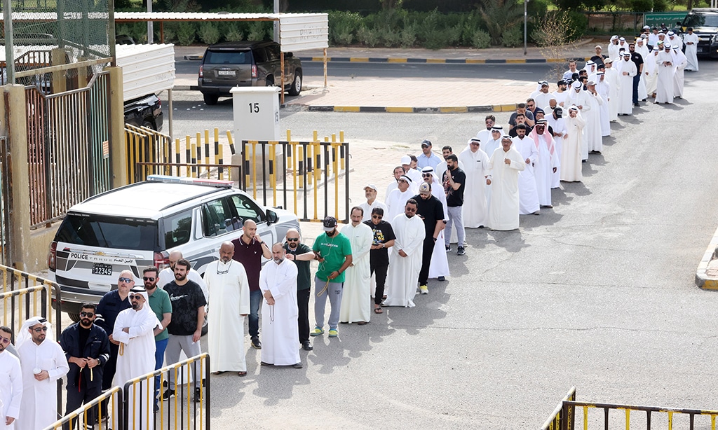 KUWAIT: Kuwaitis arrived at a polling station to vote during parliamentary elections in Kuwait City on June 6, 2023. -- Photos by Yasser Al-Zayyat