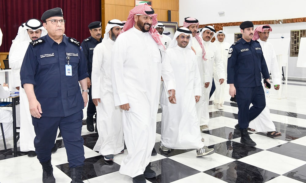 First Deputy Prime Minister, Minister of Interior, and Acting Minister of Defense flanked by officials