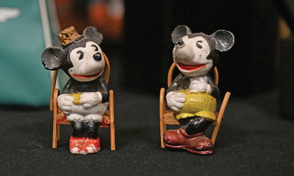 Early Mickey Mouse figurines are displayed during a media tour of the Walt Disney Archives.