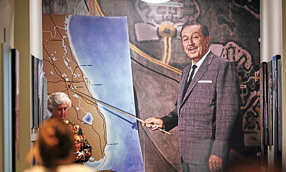 A large painting of Walt Disney hangs in the hallway outside his office during a media tour the Walt Disney Archives.