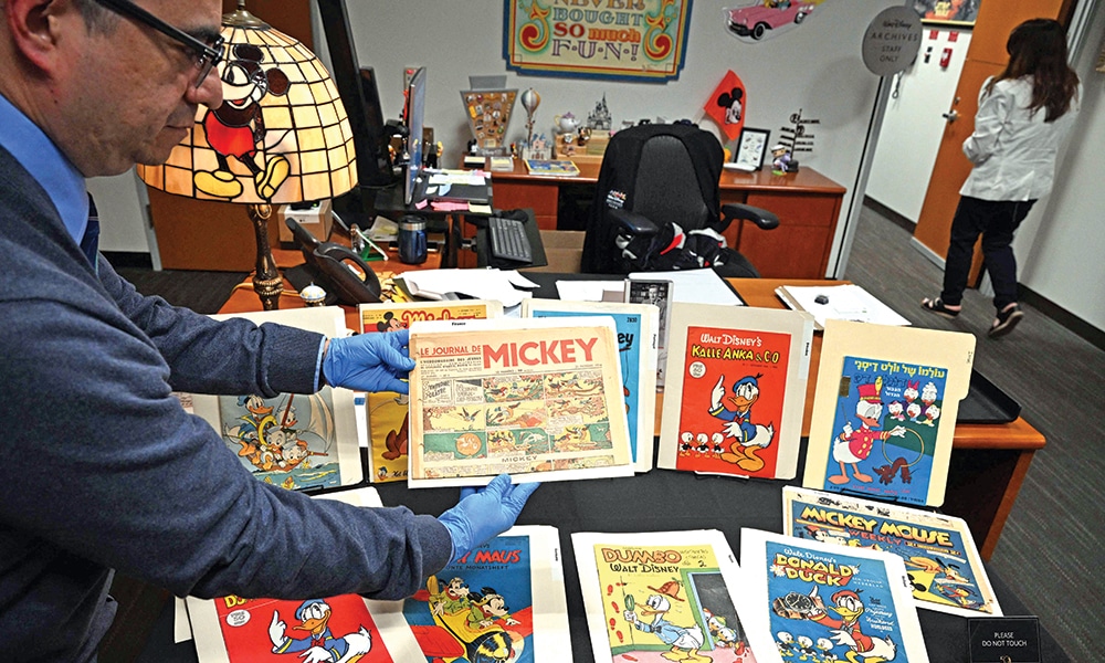'The Journal de Mickey,' the first French-language Mickey Mouse comic, published in 1934, is displayed with other foreign language first isney publications, during a media tour of the Walt Disney Archives.