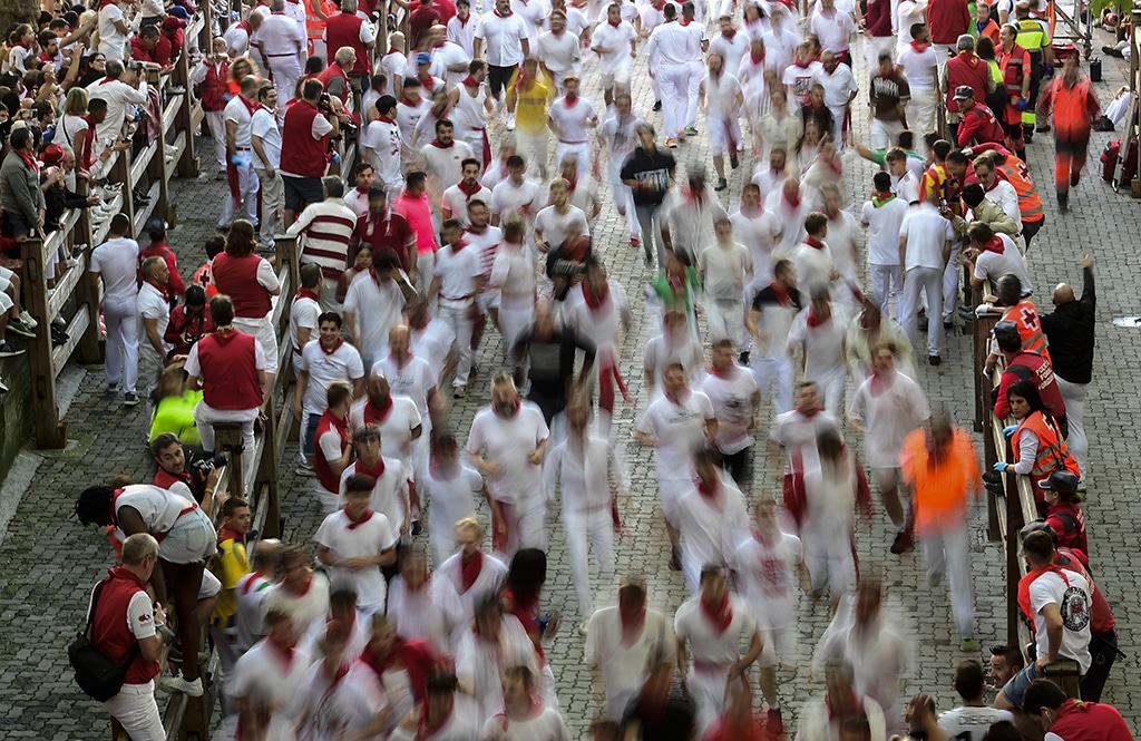 Participants run during the 'encierro' (bull-run) of the San Fermin festival in Pamplona.