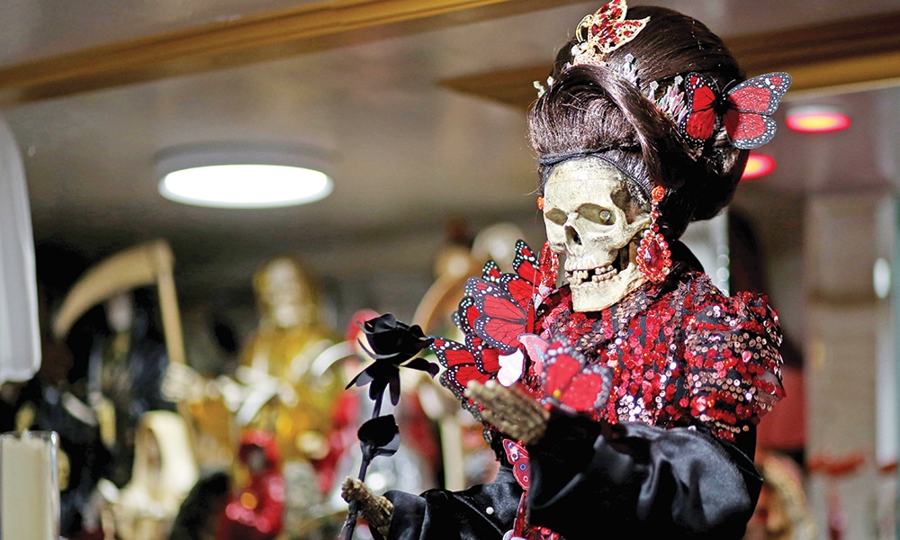 View of the Santa Muerte image placed in an altar before a Santa Muerte religious ceremony in the Queens borough of New York City.