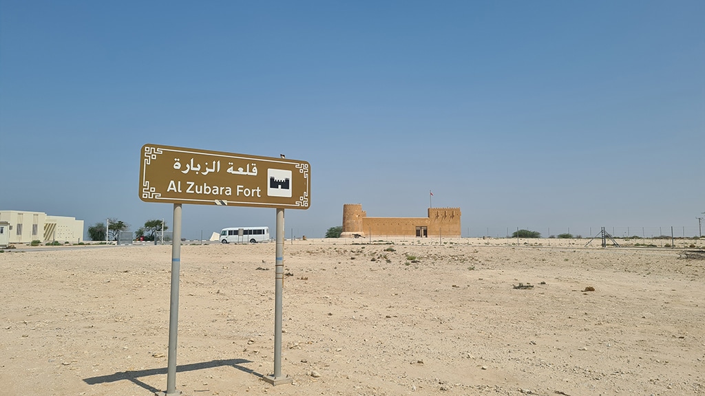 A sign for the site of Al-Zubarah Fort.