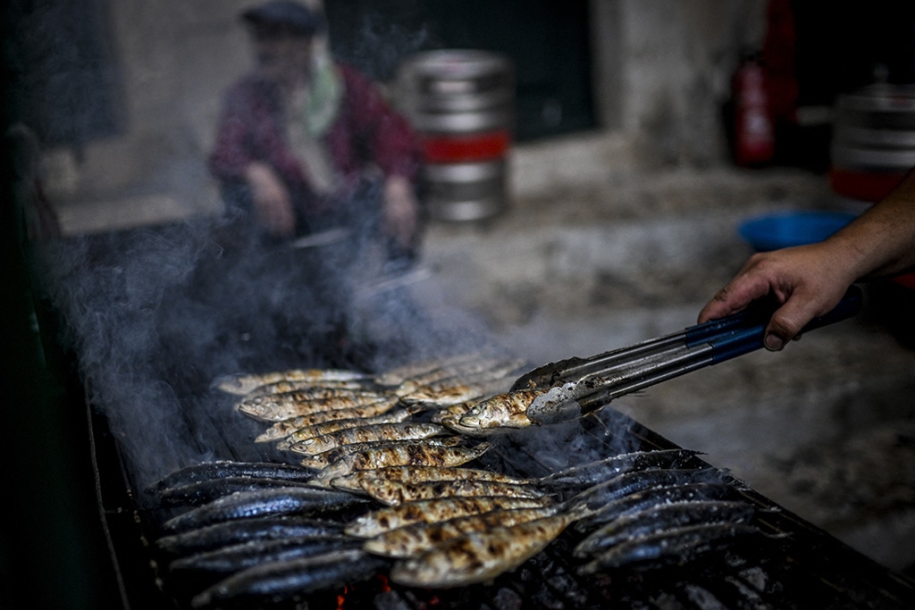 Sardines are grilled during the Saint Anthony celebration.