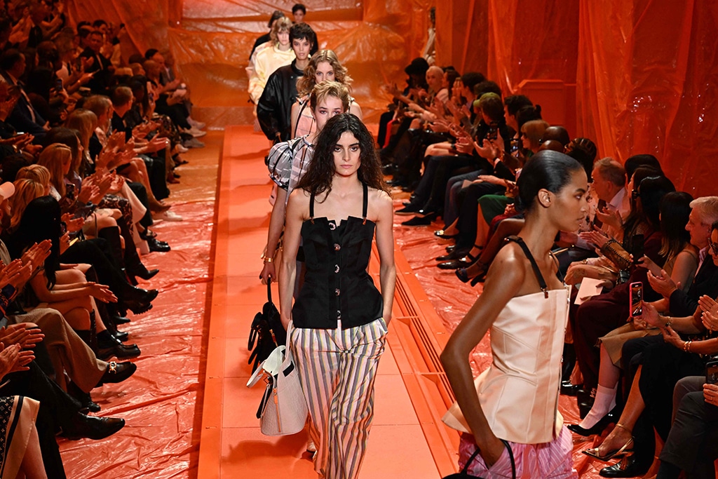 Louis Vuitton fashion show interrupted by climate activists