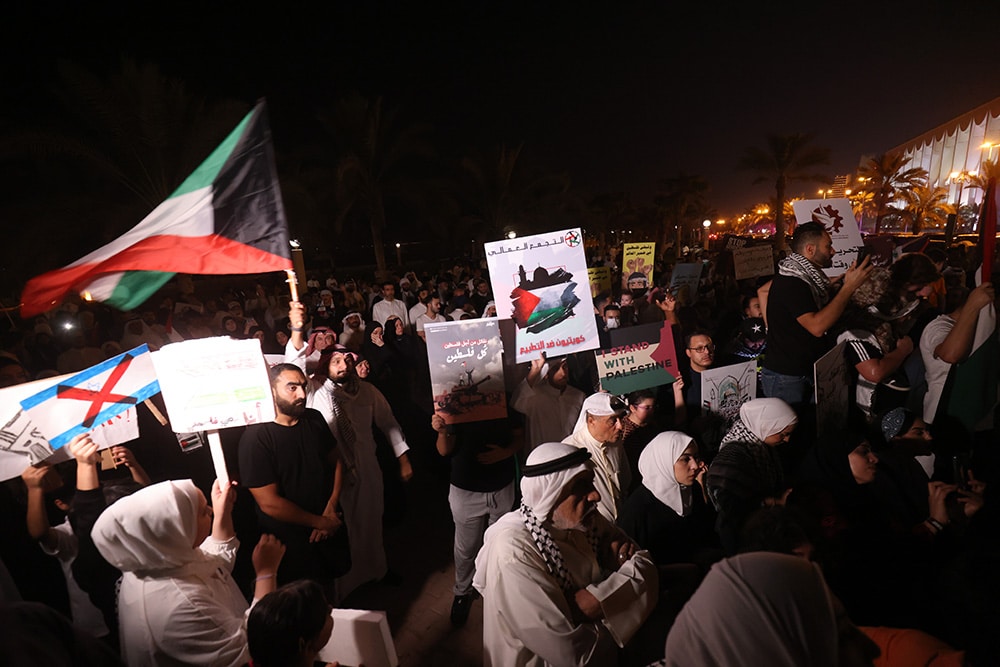 KUWAIT: People raise placards during a march to show solidarity with the Palestinians of the West Bank and the Gaza Strip, in Kuwait City on October 13, 2023. Thousands of protesters poured onto the streets of several Middle East capitals in support of Palestinians amid Zionist air strikes on Gaza. - Photos by Yasser Al-Zayyat