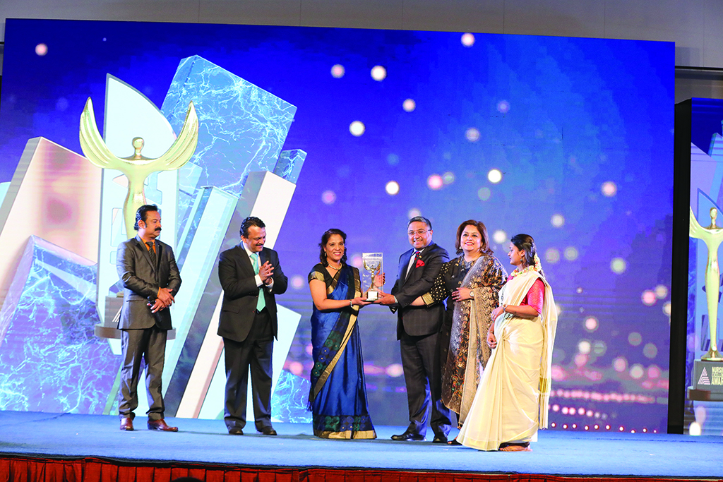 KUWAIT: Indian Ambassador Sibi George presents 'Nursing Administrator Award' to Suja Laji Joseph.